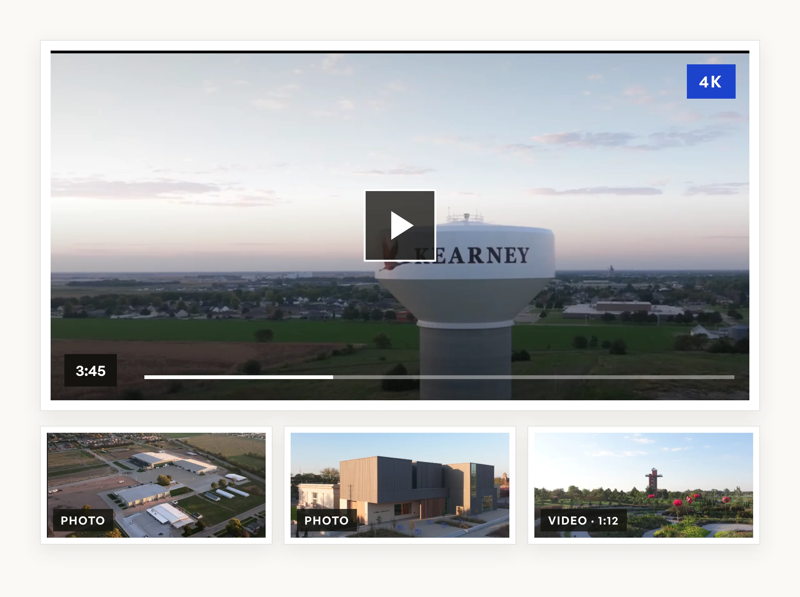A 4K walkthrough playing in a gallery, with photographs and a second clip in the row beneath it
